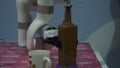 Close-up of robotic hand pouring drink. HDR. Cybernetic hand trains to pour drinks. Creation and improvement of robotics