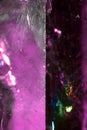 Close Up of a Rock Crystal with inclusions in Purple blue Rainbow Royalty Free Stock Photo