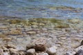 A close up of the rocky shoreline of Lake Michigan with water lapping over the rocks in Cave Point County Park, Wisconsin Royalty Free Stock Photo