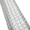 Close-up of a Roll of Clear Bubble Wrap Packaging Material Royalty Free Stock Photo