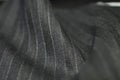 Close up roll gray fabric of suit