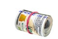 Close up of a roll of hundred dollar bills