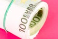Close-up of a roll of one hundred euro banknotes. Royalty Free Stock Photo