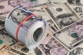 Close Up Roll of One Hundred US Dollar Bills Secured with Red Rubber Band Royalty Free Stock Photo