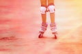 Close up of roller skater girl. Toned image Royalty Free Stock Photo