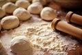 close-up of rolling pin flattening dough balls