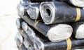 Close-up of rolls of new black roofing felt or bitumen that is precisely folded Royalty Free Stock Photo