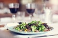 Couple eating romantic Dinner in a gourmet restaurant drinking wine and eating