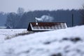 House in the snow, chimney and roof close-up Royalty Free Stock Photo