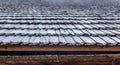 Close-up, the roof of a house made of wooden tiles. Royalty Free Stock Photo