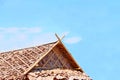 Roof made from bamboo and dry leafs on sky background Royalty Free Stock Photo