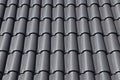 Close-up of a roof made of grey roman tiles Royalty Free Stock Photo