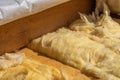 Close-up of roof rafters and stone wool insulation