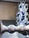Close up rotating part CNC milling machine during metal processing