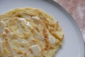 Close up of Roti indian food grilled crispy and condensed milk on white plate Royalty Free Stock Photo