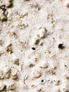 Close up of rough cobbled white texture of stone wall Royalty Free Stock Photo