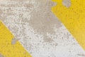 Close-up of rough speed bump in yellow and black color texture,