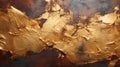 Close-up of rough, textured metallic surface painted with shiny gold