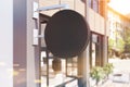 Close up of a round cafe sign, toned