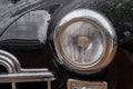 Close up: round car headlight at Classic Soviet Car Exhibition Royalty Free Stock Photo