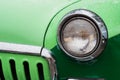 Close up: round car headlight at Classic Soviet Car Exhibition Royalty Free Stock Photo