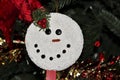 Snowman Face Christmas Decoration on Christmas Tree Royalty Free Stock Photo