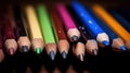 A close up of a row of colored pencils with one in the middle, AI Royalty Free Stock Photo