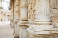 Close up row of columns receding into the distance. Pillars in Old Retro Style