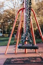 Close up of a row of emplty swings Royalty Free Stock Photo