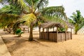 Close up of a row of Seaside thatched huts on Awolowo beach Lekki Lagos Nigeria