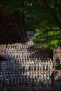 Close-up row of stone Jizo Bodhisattva statues in Kamakura, Japan.