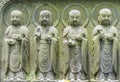 Close-up row of stone Jizo Bodhisattva statues in Kamakura, Japan.