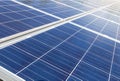 Close up rows array of polycrystalline silicon solar cells or photovoltaics in solar power plant alternative renewable energy from Royalty Free Stock Photo