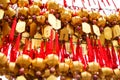 Close up rows Devotees hanging golden prayer bells for blessing at at Wong Tai Sin Temple, Hong Kong Royalty Free Stock Photo