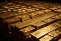 close-up of rows of gleaming ingot bars of gold