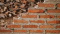 Close-up of the rubble of an industrial building collapsing into a pile of concrete and brick. and the jagged debris caused by the