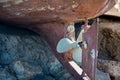 Close Up Of A Rudder And A Rusty Propeller Of A Dry Wooden Old B Royalty Free Stock Photo