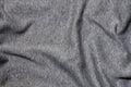 Close-up of rumpled heater and knitted sport jersey or hoodie fabric textured cloth background with delicate striped patter