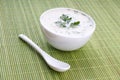 Close-up of russian cold vegetable soup on yoghurt