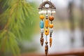 close-up of a rust-free wind chime after the rain Royalty Free Stock Photo