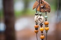 close-up of a rust-free wind chime after the rain Royalty Free Stock Photo