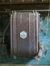 Close up of a rusted Brown Electrical Switch cover within a Technical Building at Stracathro Airfield