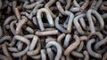 Close up of rusted metal chains, Rusty Chain Images,Chains of the past pile up in a heap, Brown metal chains with rust n ground, Royalty Free Stock Photo