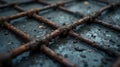 Close-Up of Rusted Rebar Grid on a Wet Industrial Surface Royalty Free Stock Photo