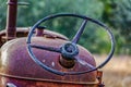 Close-up of rusted tractor steering wheel Royalty Free Stock Photo