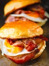 Rustic bacon egg breakfast sandwich bun Royalty Free Stock Photo