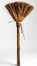 Close Up Of A Rustic Broom Made Of Straw And Wood On White Background Royalty Free Stock Photo
