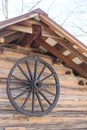 Rustic Cabin with Wagon Wheel Royalty Free Stock Photo