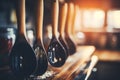 Close-up of rustic handmade wooden spatulas hanging in the kitchen