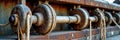 Close-up of rustic nautical pulleys with ropes on weathered metal background Royalty Free Stock Photo